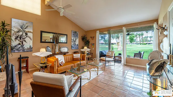 a bedroom with bed and a window