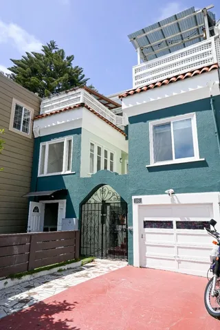 a front view of a house with a garage