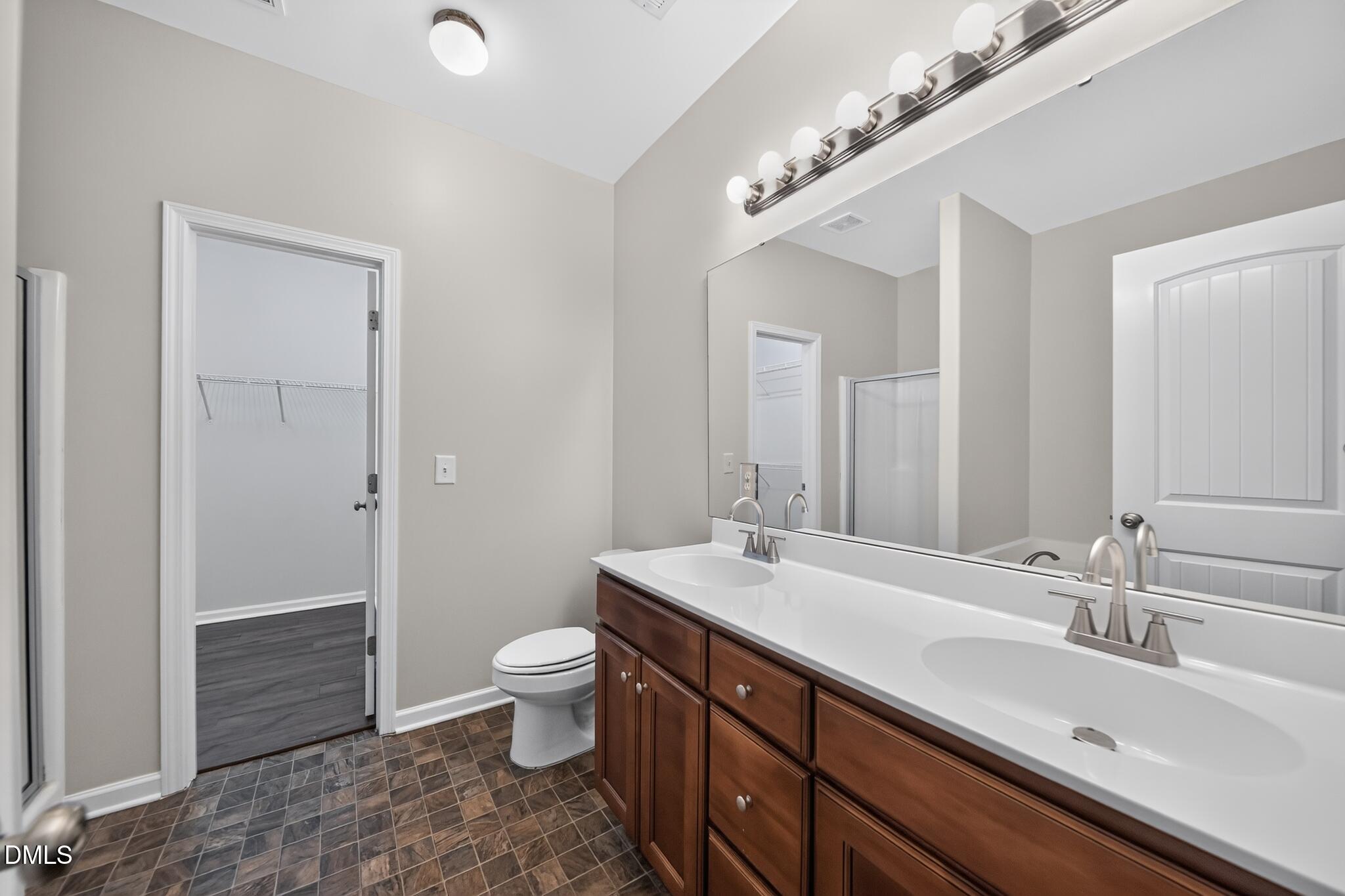 6443 Hatchies Drive Raleigh, NC 27610 - Photo 10 of 19 18_6443_Hatchies_Dr-Bathroom-0697