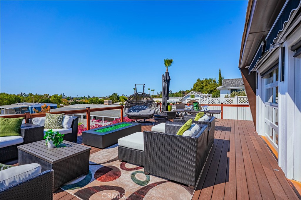 1120 East Mission Road, Unit 102 Fallbrook, CA 92028 - Photo 41 of 62 a view of a terrace with furniture