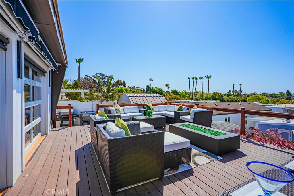 1120 East Mission Road, Unit 102 Fallbrook, CA 92028 - Photo 42 of 62 a view of a terrace with furniture