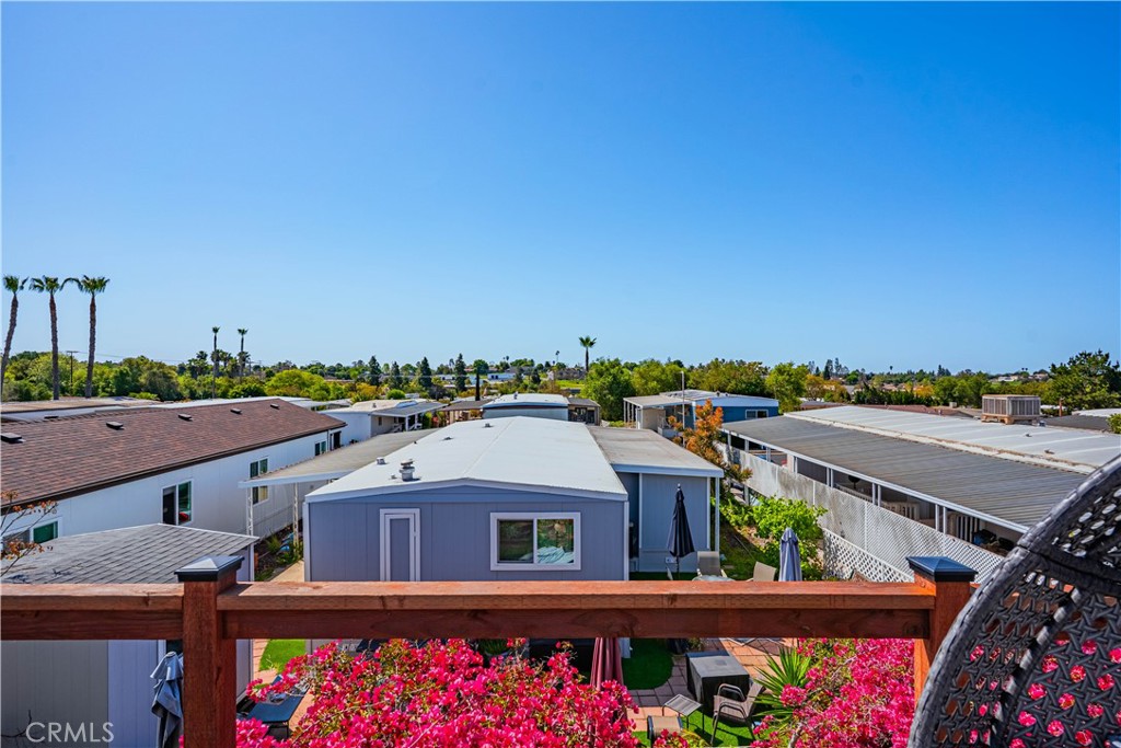 1120 East Mission Road, Unit 102 Fallbrook, CA 92028 - Photo 43 of 62 an aerial view of a house with a garden
