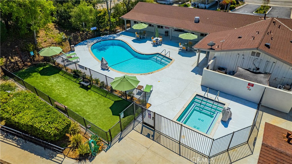 1120 East Mission Road, Unit 102 Fallbrook, CA 92028 - Photo 48 of 62 an aerial view of a house with a swimming pool