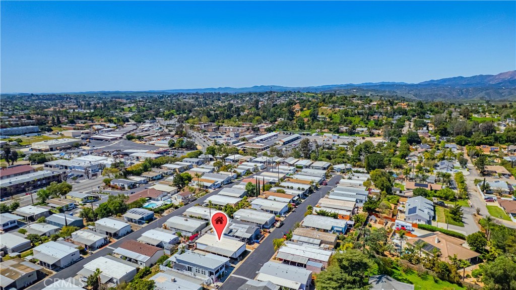 1120 East Mission Road, Unit 102 Fallbrook, CA 92028 - Photo 57 of 62 an aerial view of a city with lots of residential buildings