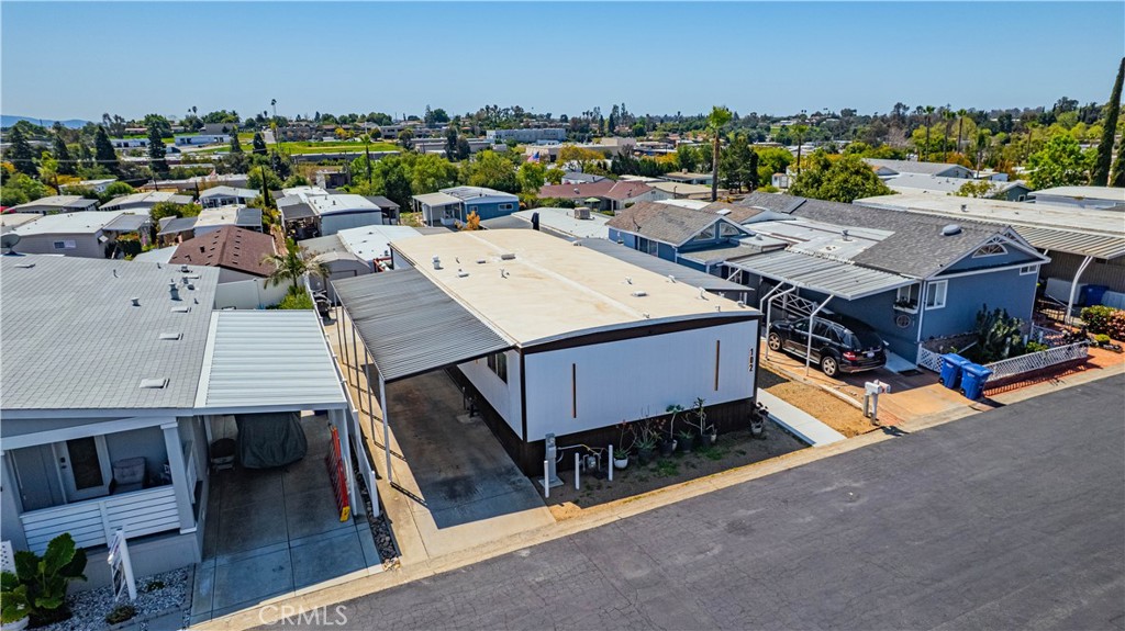 1120 East Mission Road, Unit 102 Fallbrook, CA 92028 - Photo 59 of 62 a view of a terrace with a table and chairs