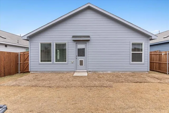a view of backyard of house
