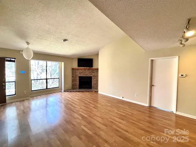 a bedroom with a bed and a table