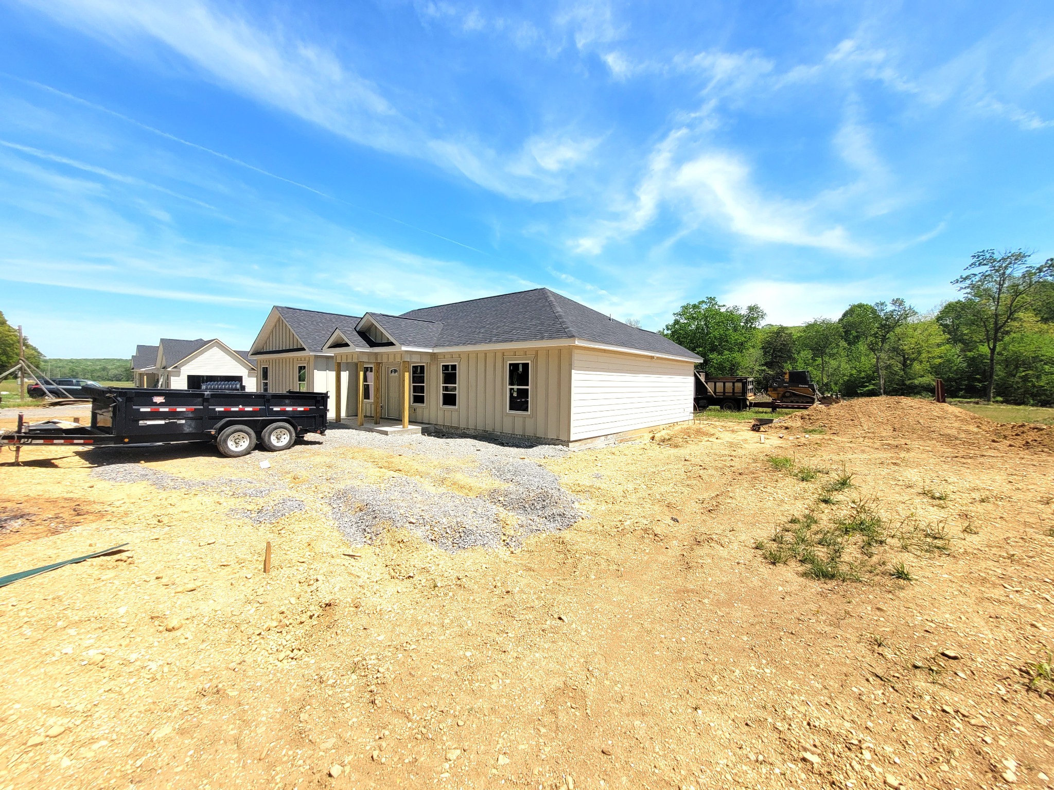 1588 Gilliam Hollow Road Dickson, TN 37055 - Photo 2 of 14 a front view of a house with a yard