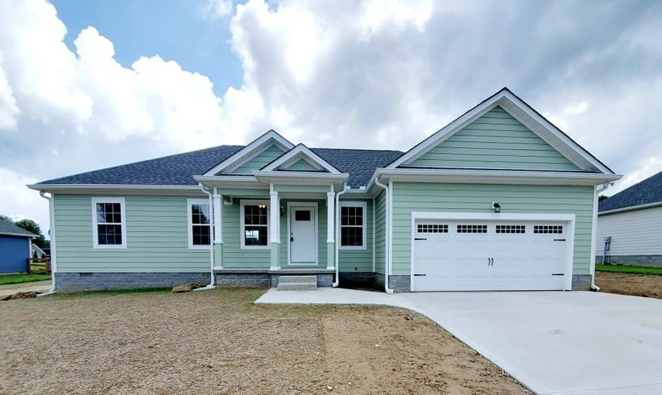 1588 Gilliam Hollow Road Dickson, TN 37055 - Photo 5 of 14 a view of a house with a garage