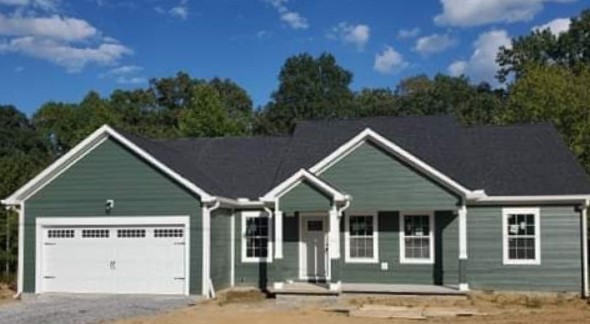 1588 Gilliam Hollow Road Dickson, TN 37055 - Photo 6 of 14 a view of a house with a yard