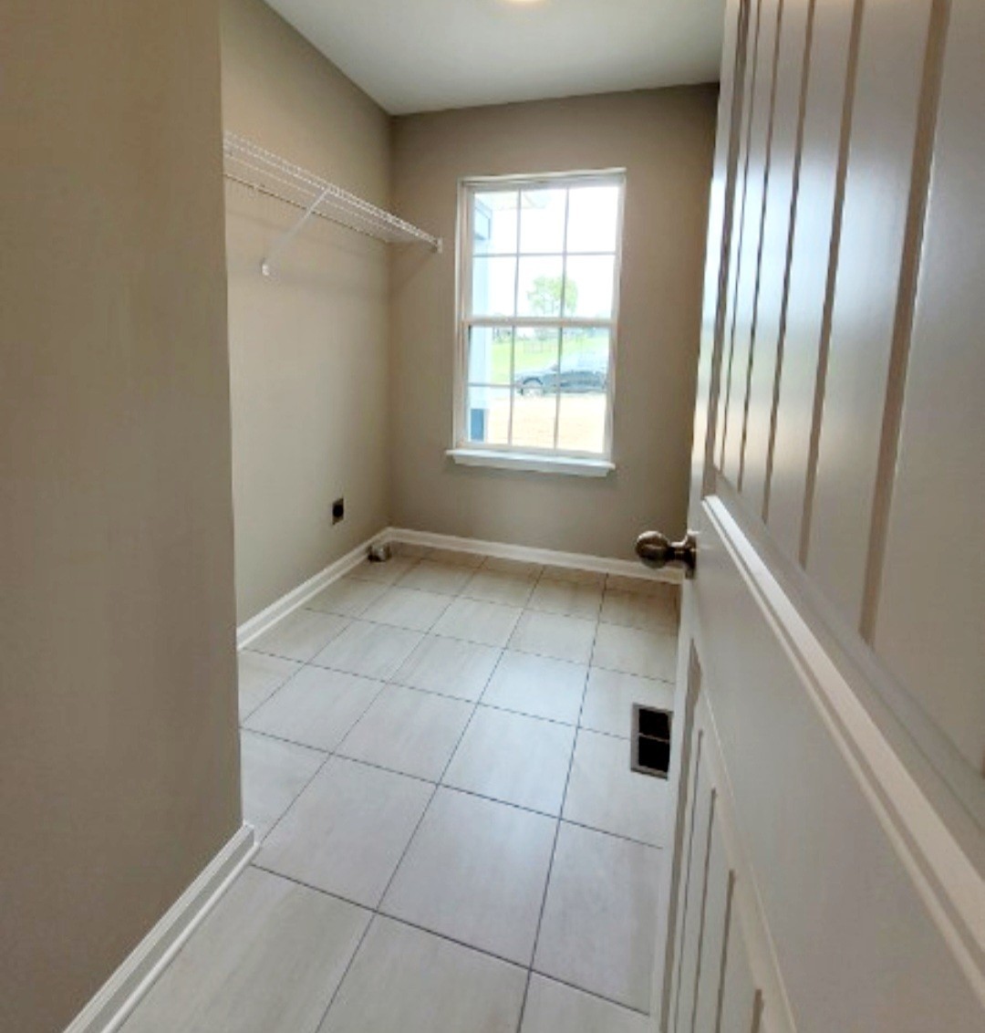 1588 Gilliam Hollow Road Dickson, TN 37055 - Photo 10 of 14 a view of an empty room with a window