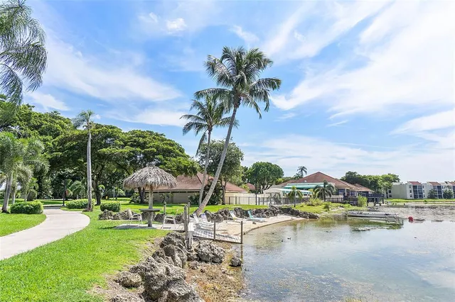 a view of street with tall buildings