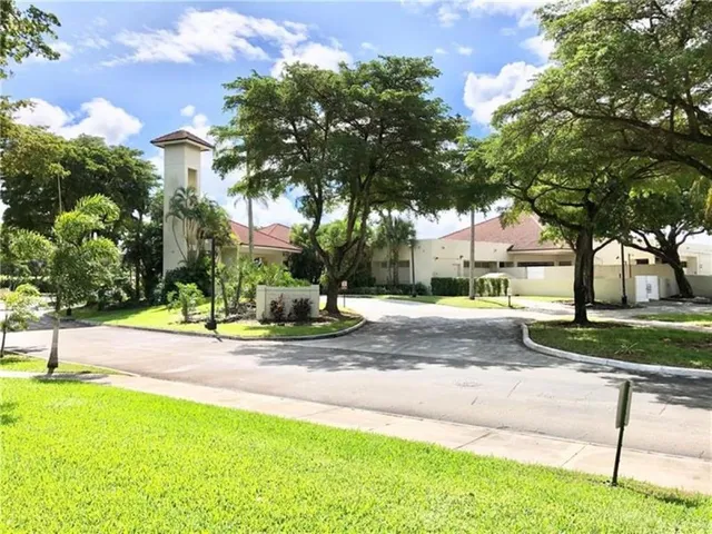 a view of backyard with tree
