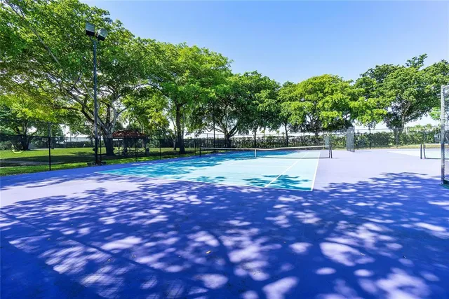a view of a swimming pool with a lake view