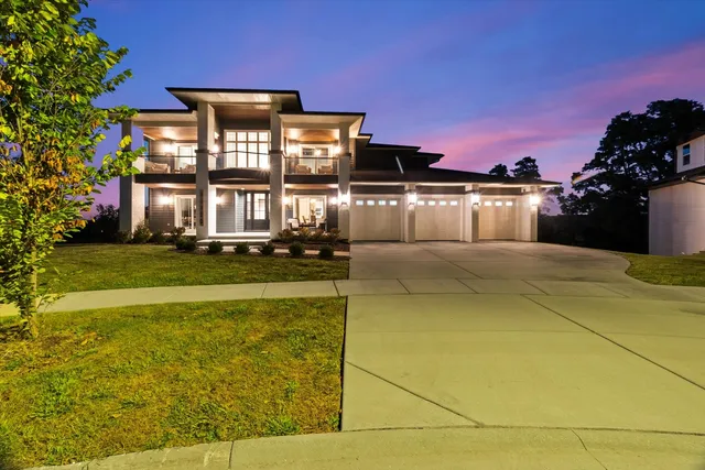 a view of a big house with a big yard