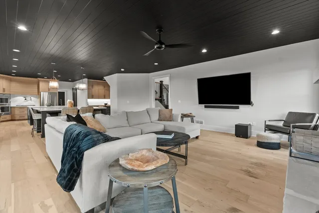 a kitchen with stainless steel appliances a stove and a refrigerator