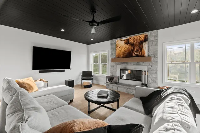 a kitchen with stainless steel appliances and white cabinets