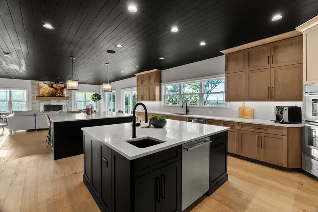 a bedroom with a bed and a flat screen television