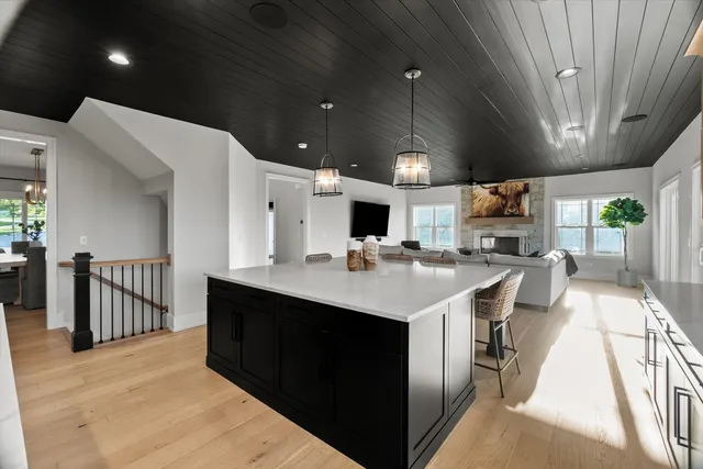 a bathroom with double vanity sinks and a mirror