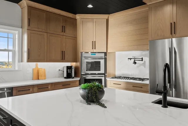 a white bath tub sitting next to a window