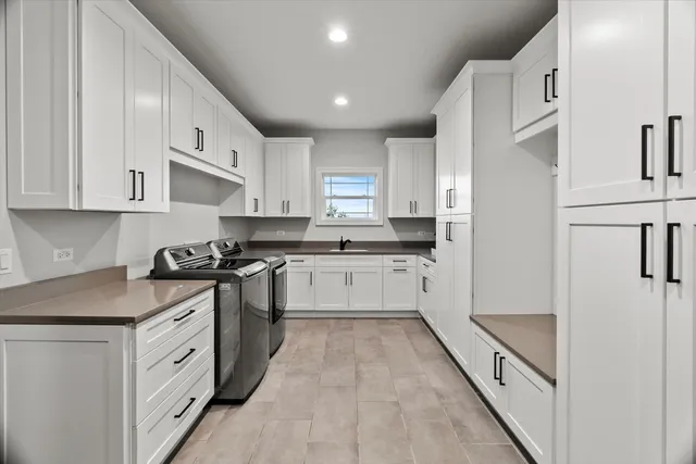 a view of living room with furniture and a garden