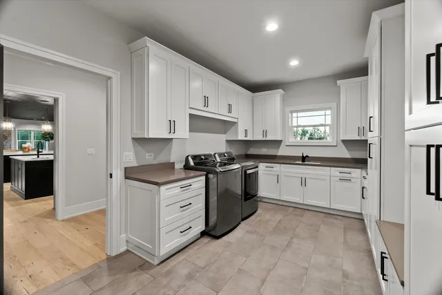 a spacious bedroom with a bed and a large window