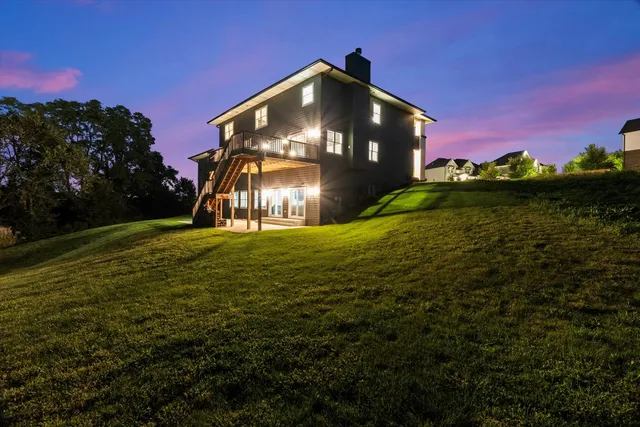 an aerial view of a house with a garden