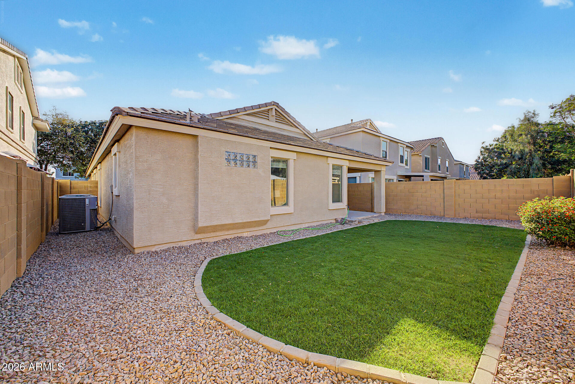 4168 East Sandy Way Gilbert, AZ 85297 - Photo 29 of 47 a view of a house with a yard