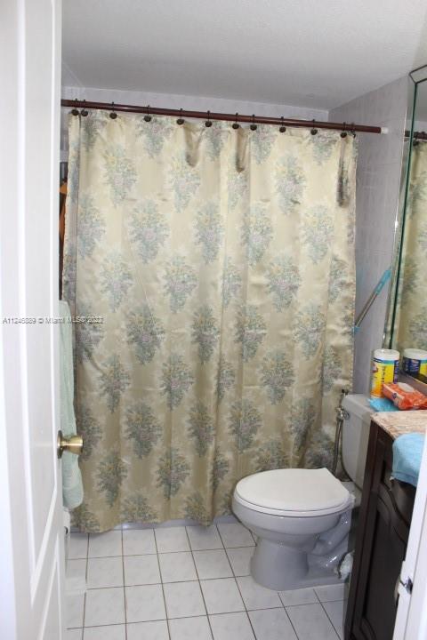Hialeah Hialeah, FL 33018 - Photo 14 of 18 a bathroom with a toilet a sink and shower