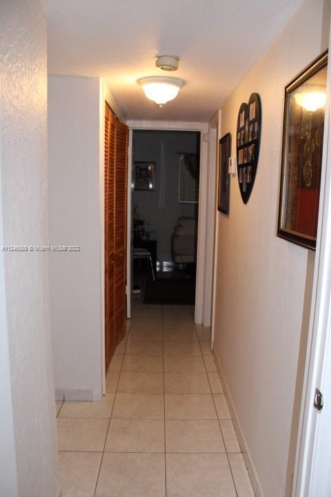 Hialeah Hialeah, FL 33018 - Photo 17 of 18 a view of a hallway to rooms
