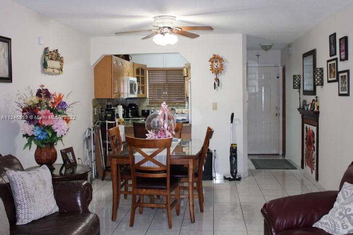 Hialeah Hialeah, FL 33018 - Photo 8 of 18 a view of a dining room with furniture and a chandelier