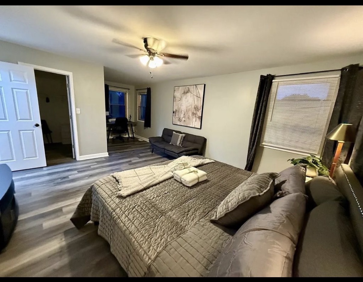 436 Springhill Drive Roselle, IL 60172 - Photo 8 of 11 a bedroom with a bed and wooden floor