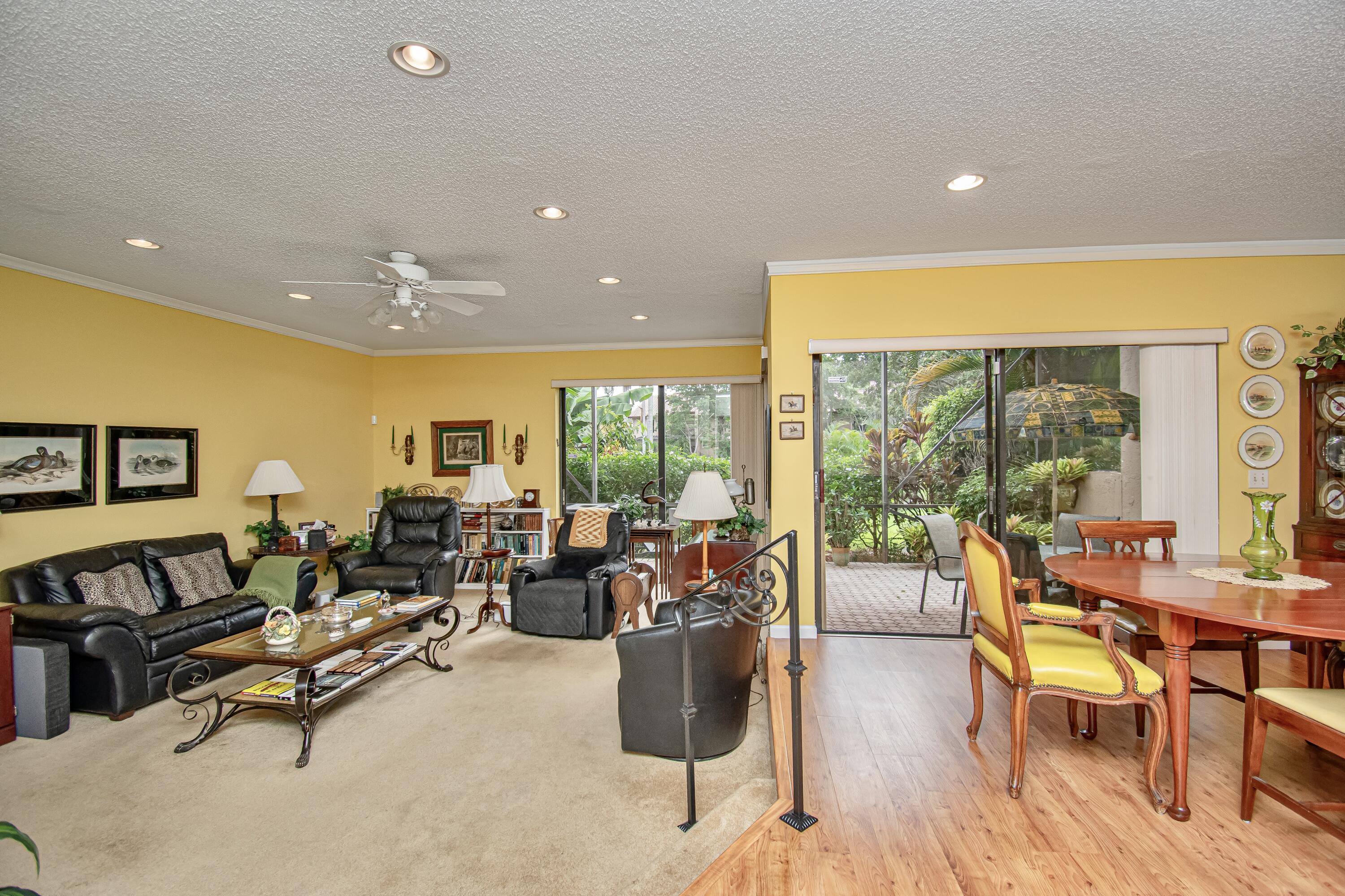 22066 Las Brisas Circle Boca Raton, FL 33433 - Photo 14 of 45 a living room with furniture and a large window