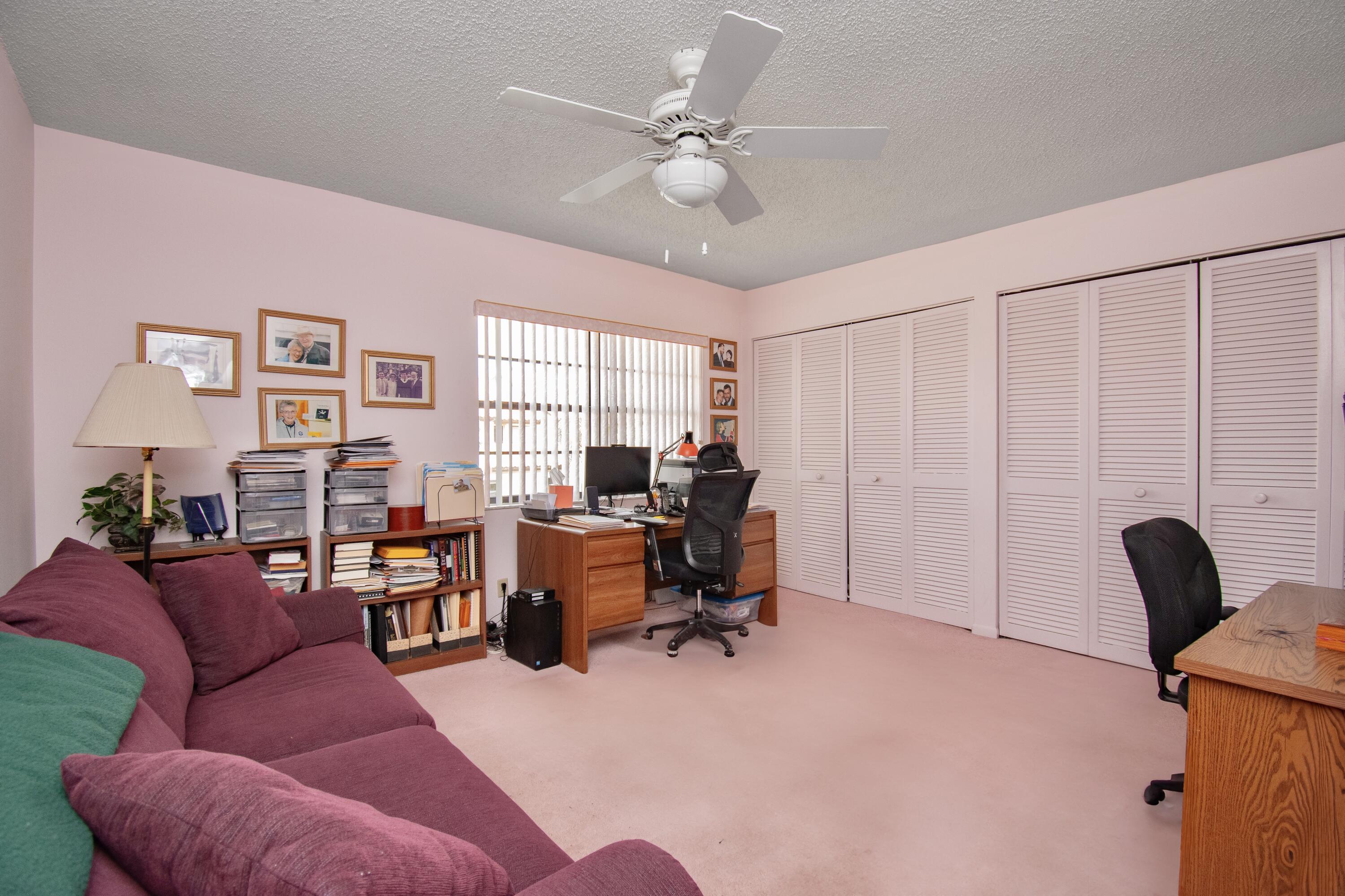 22066 Las Brisas Circle Boca Raton, FL 33433 - Photo 31 of 45 a view of a livingroom with workspace and a couch