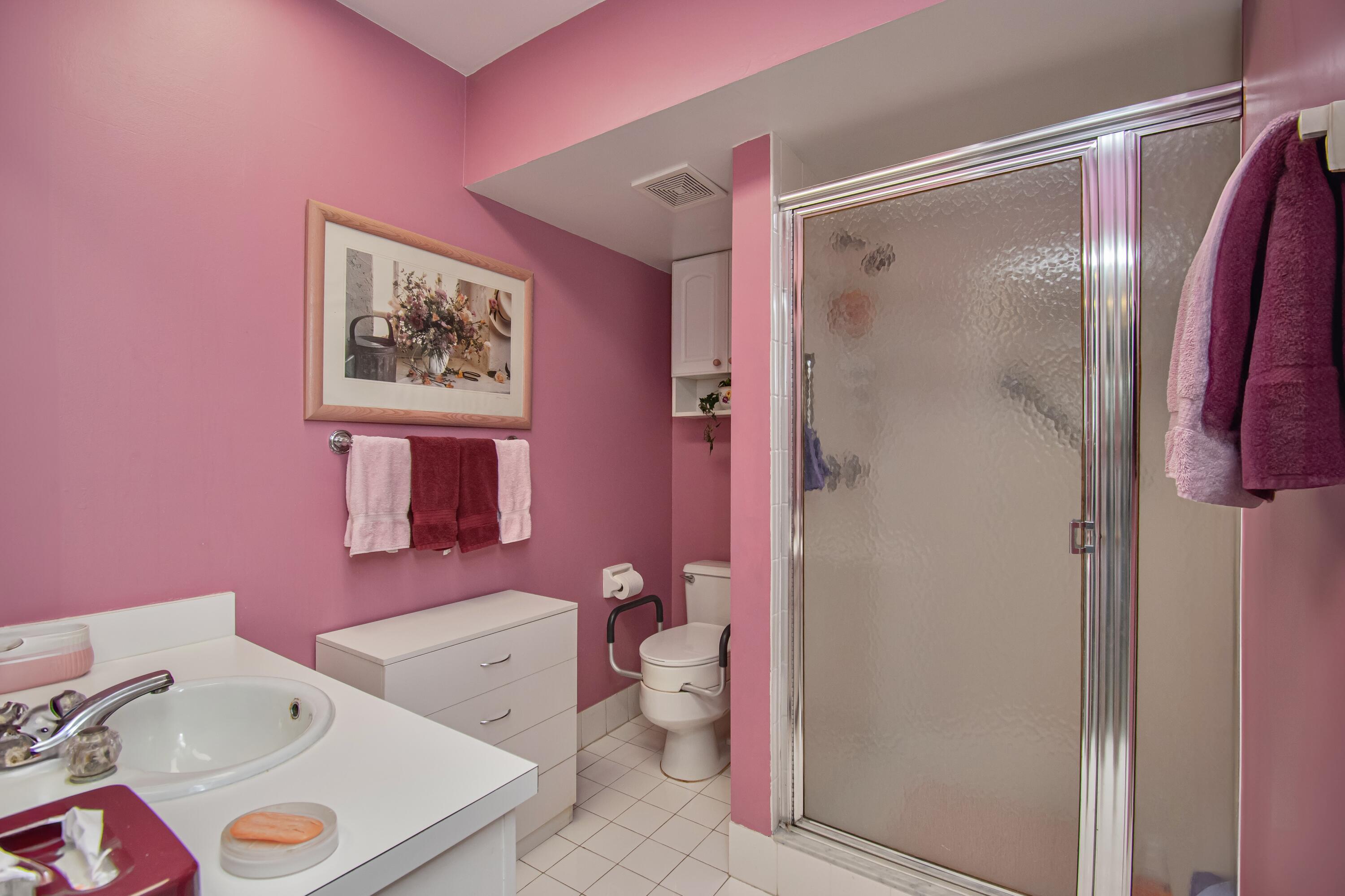 22066 Las Brisas Circle Boca Raton, FL 33433 - Photo 33 of 45 a bathroom with a sink vanity granite and toilet