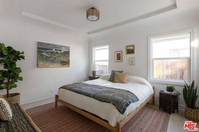 a bathroom with a sink a mirror and vanity
