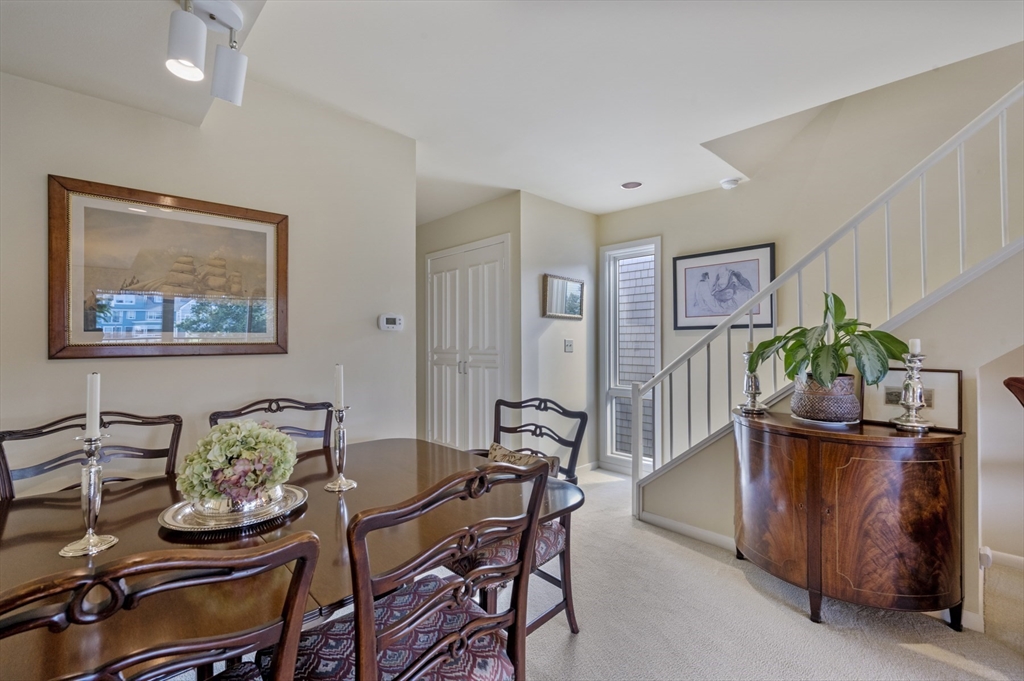 9 Skinner's Path, Unit 9 Marblehead, MA 01945 - Photo 7 of 23 a dining room with furniture and window
