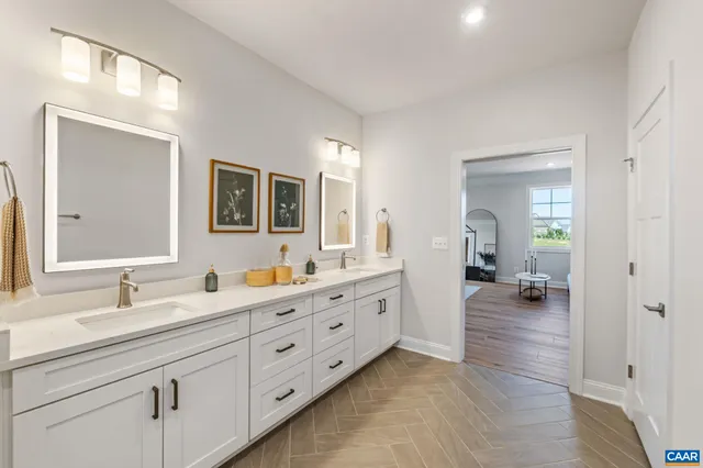 a view of room with window and wooden floor