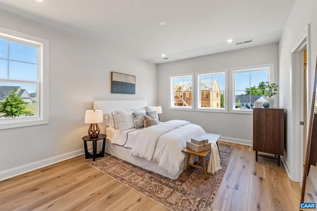 a bedroom with a bed and a closet