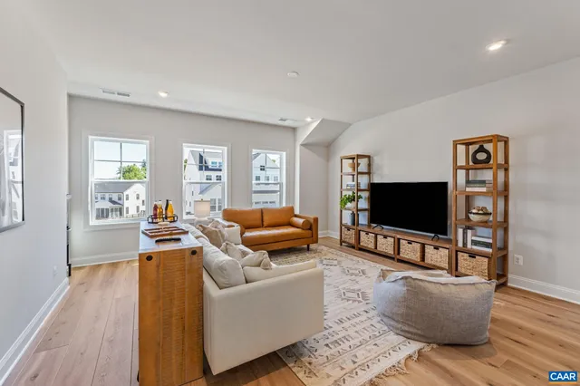 a living room with furniture and a couch