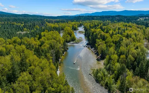 a view of a lake with a mountain in the background
