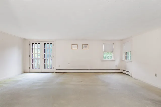 an empty room with window