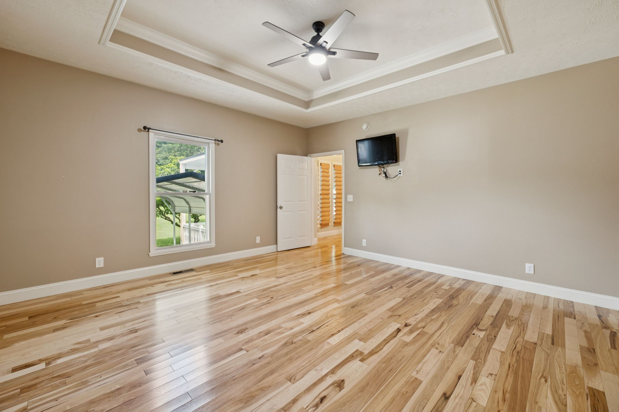 314 West Main Street Alexandria, TN 37012 - Photo 29 of 53 wooden floor in an empty room with a window
