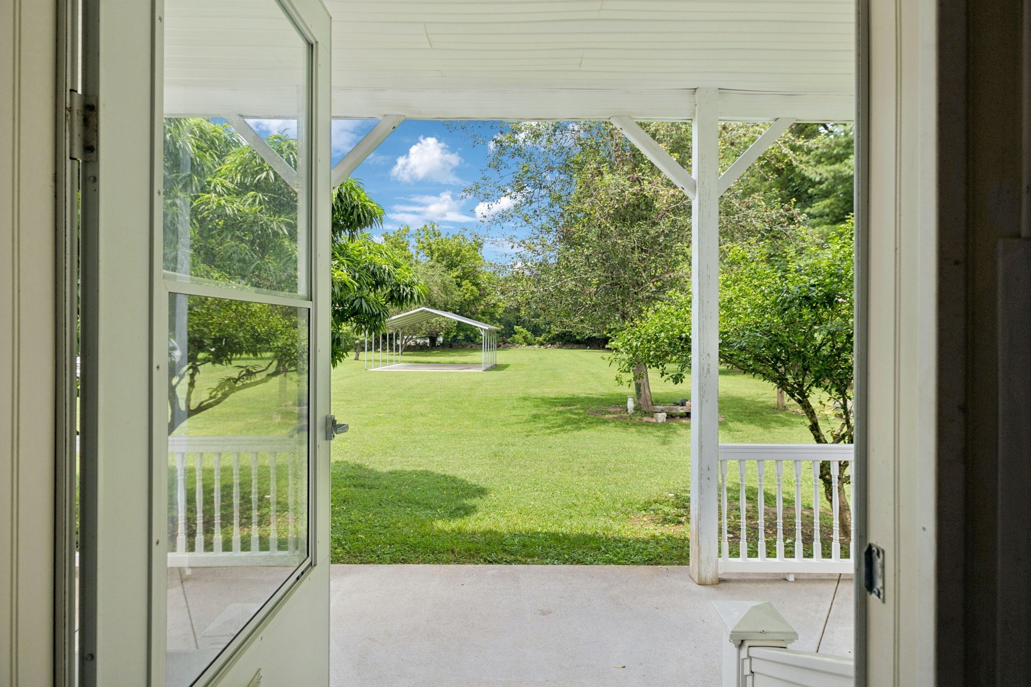 314 West Main Street Alexandria, TN 37012 - Photo 4 of 53 a view of a garden from a window