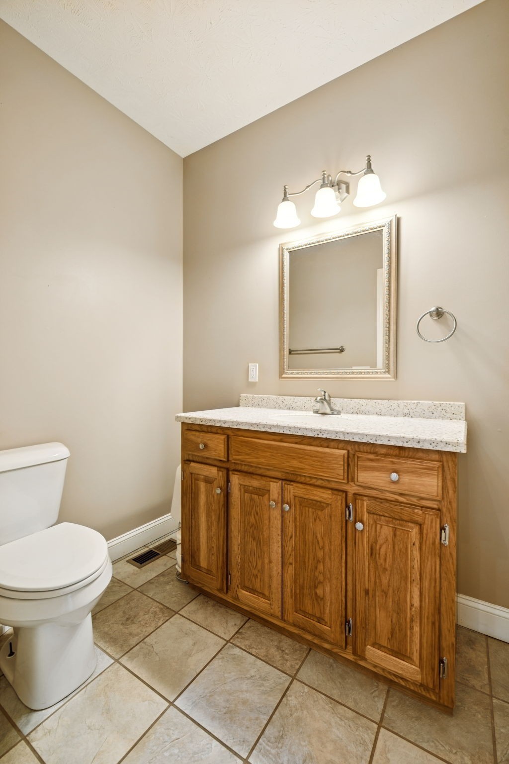 314 West Main Street Alexandria, TN 37012 - Photo 42 of 53 a bathroom with a granite countertop sink mirror and toilet