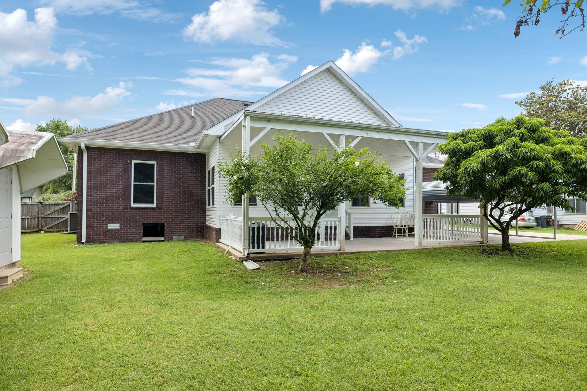 314 West Main Street Alexandria, TN 37012 - Photo 50 of 53 a view of a house with a yard porch and sitting area