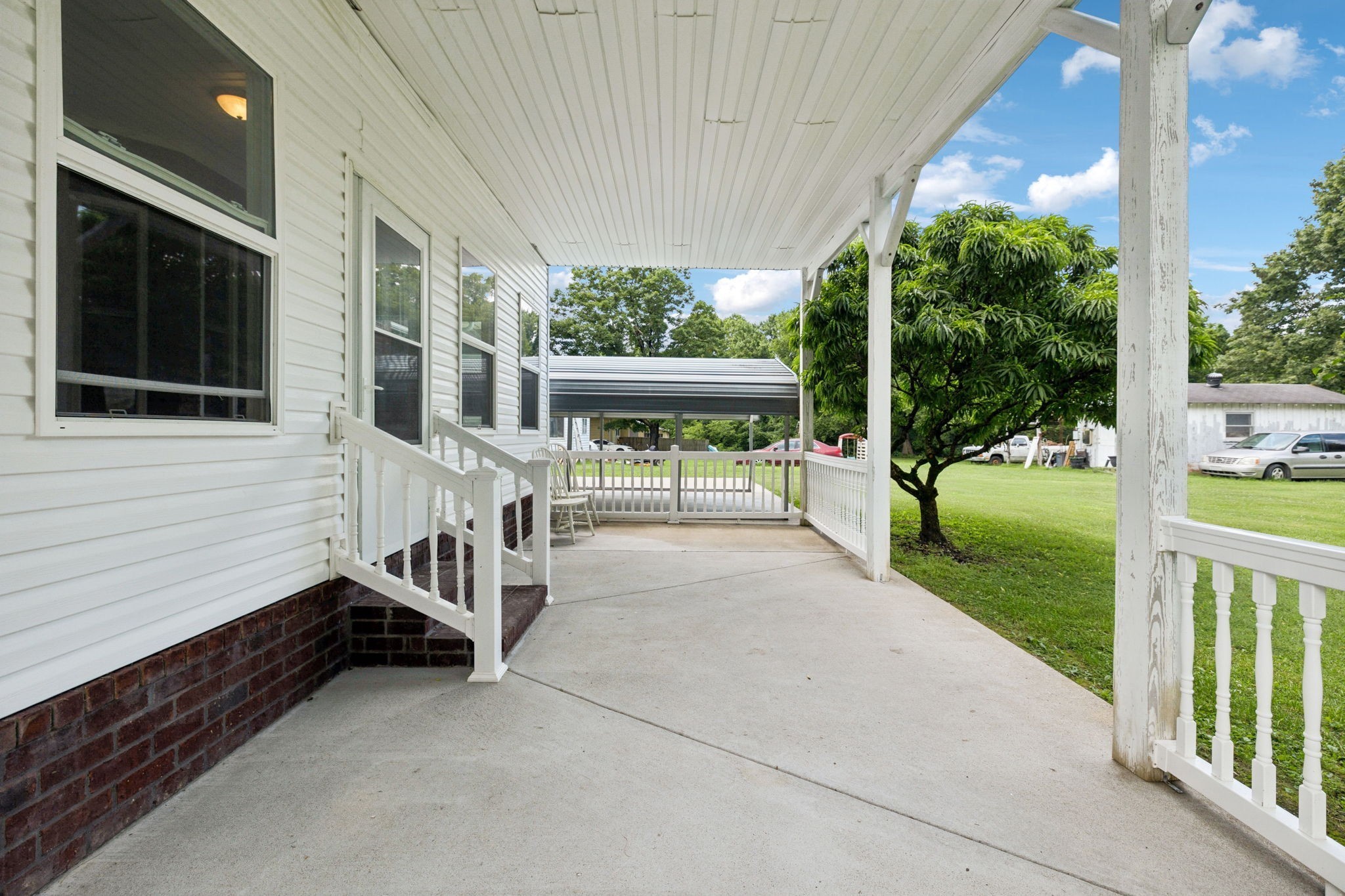 314 West Main Street Alexandria, TN 37012 - Photo 6 of 53 a view of a house with backyard and porch