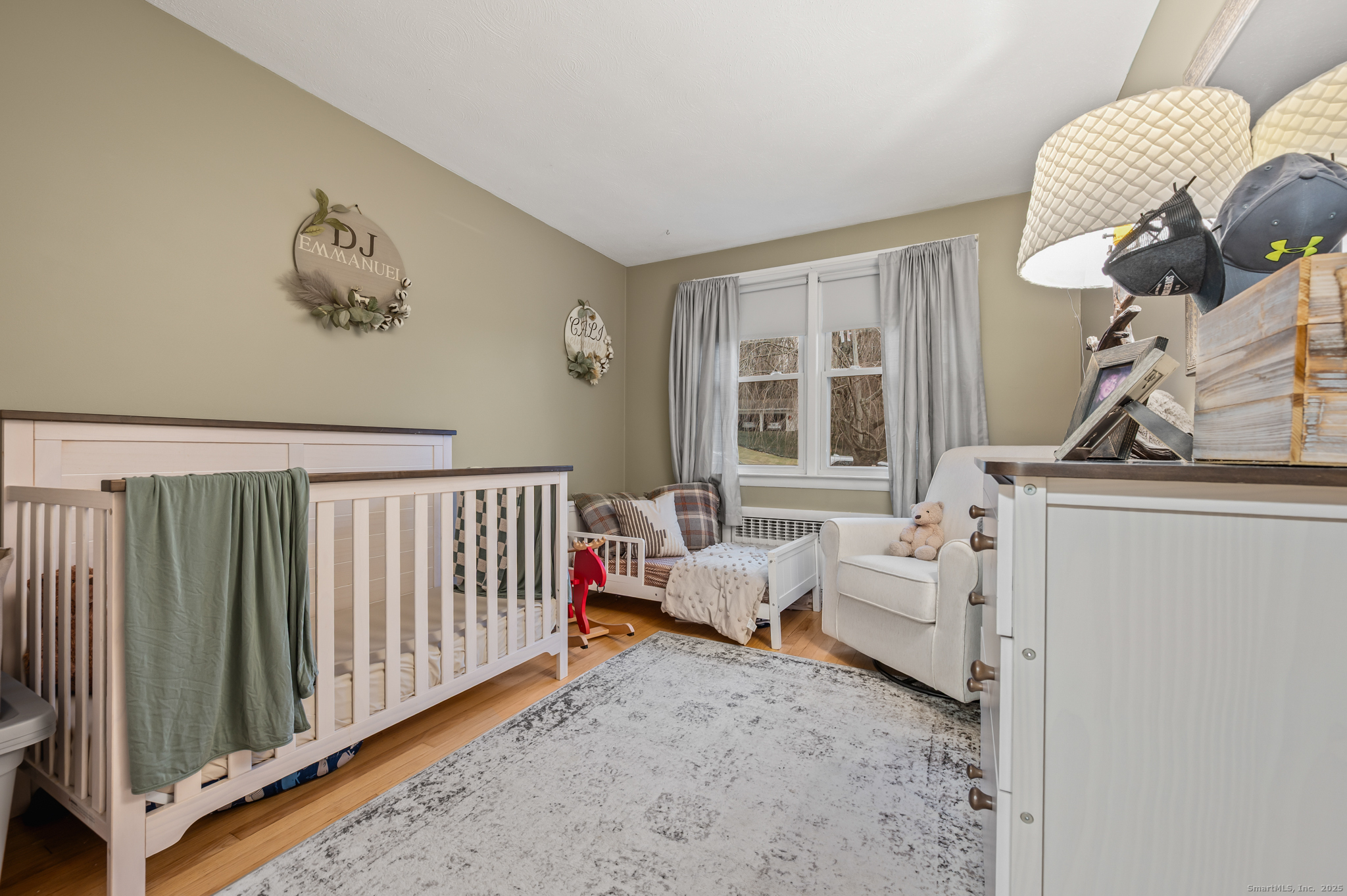 24 William Street Portland, CT 06480 - Photo 18 of 35 a living room with furniture and a window