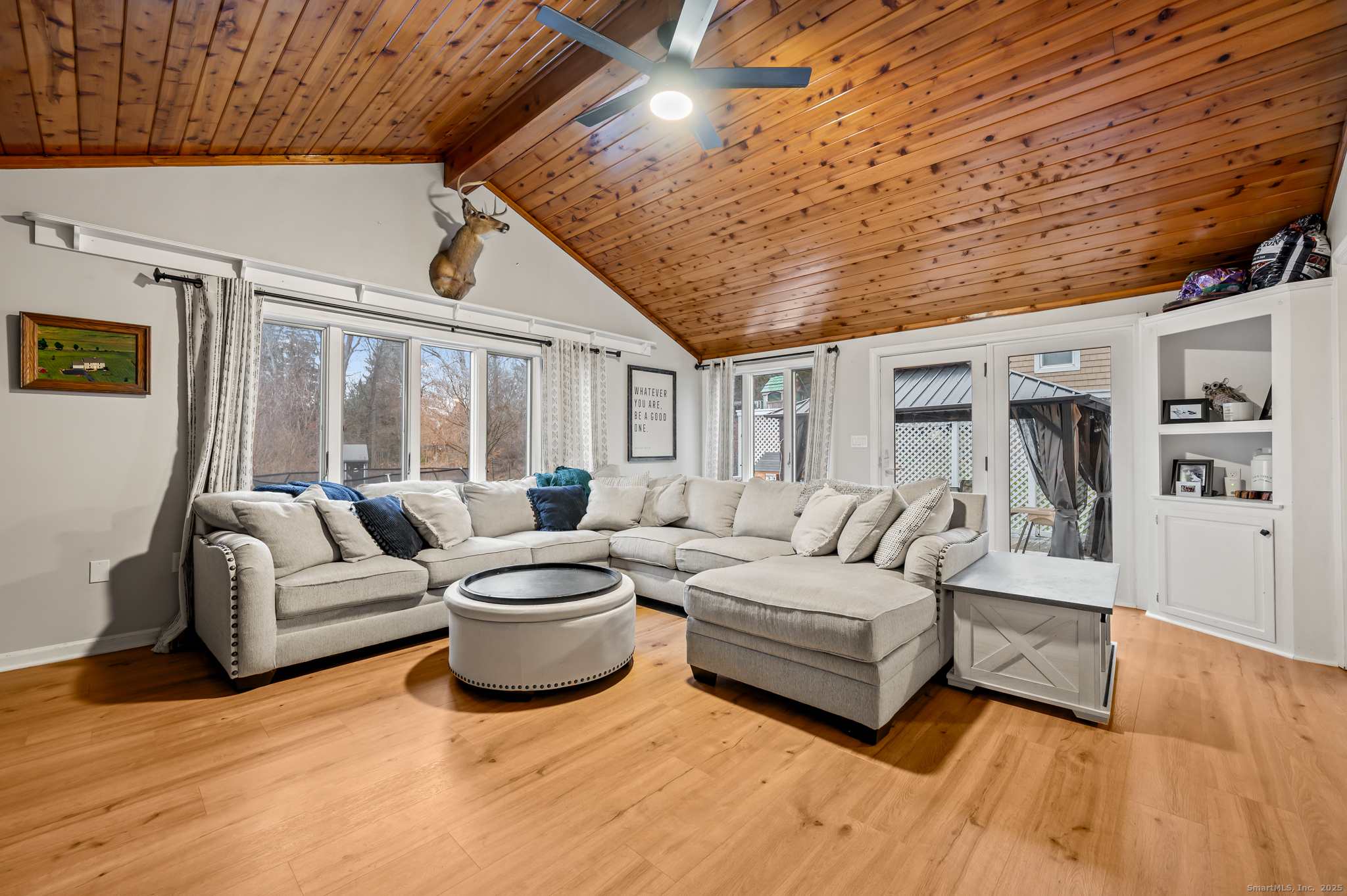 24 William Street Portland, CT 06480 - Photo 22 of 35 a living room with furniture and a large window