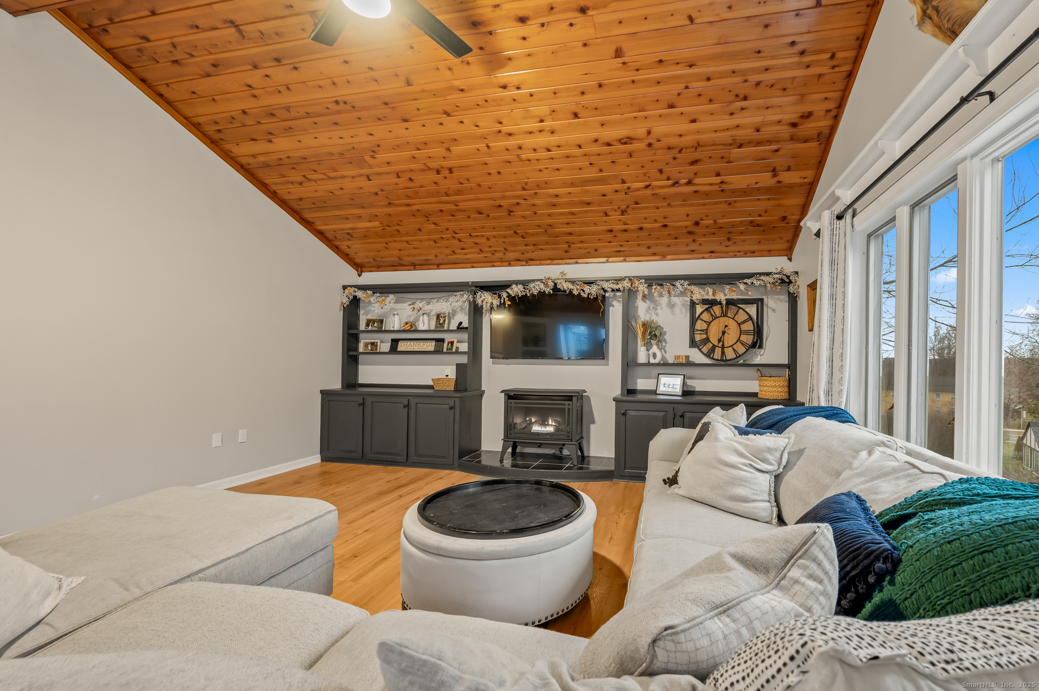 24 William Street Portland, CT 06480 - Photo 23 of 35 a living room with furniture and window